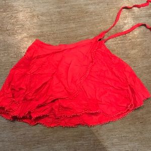 En Creme red skirt